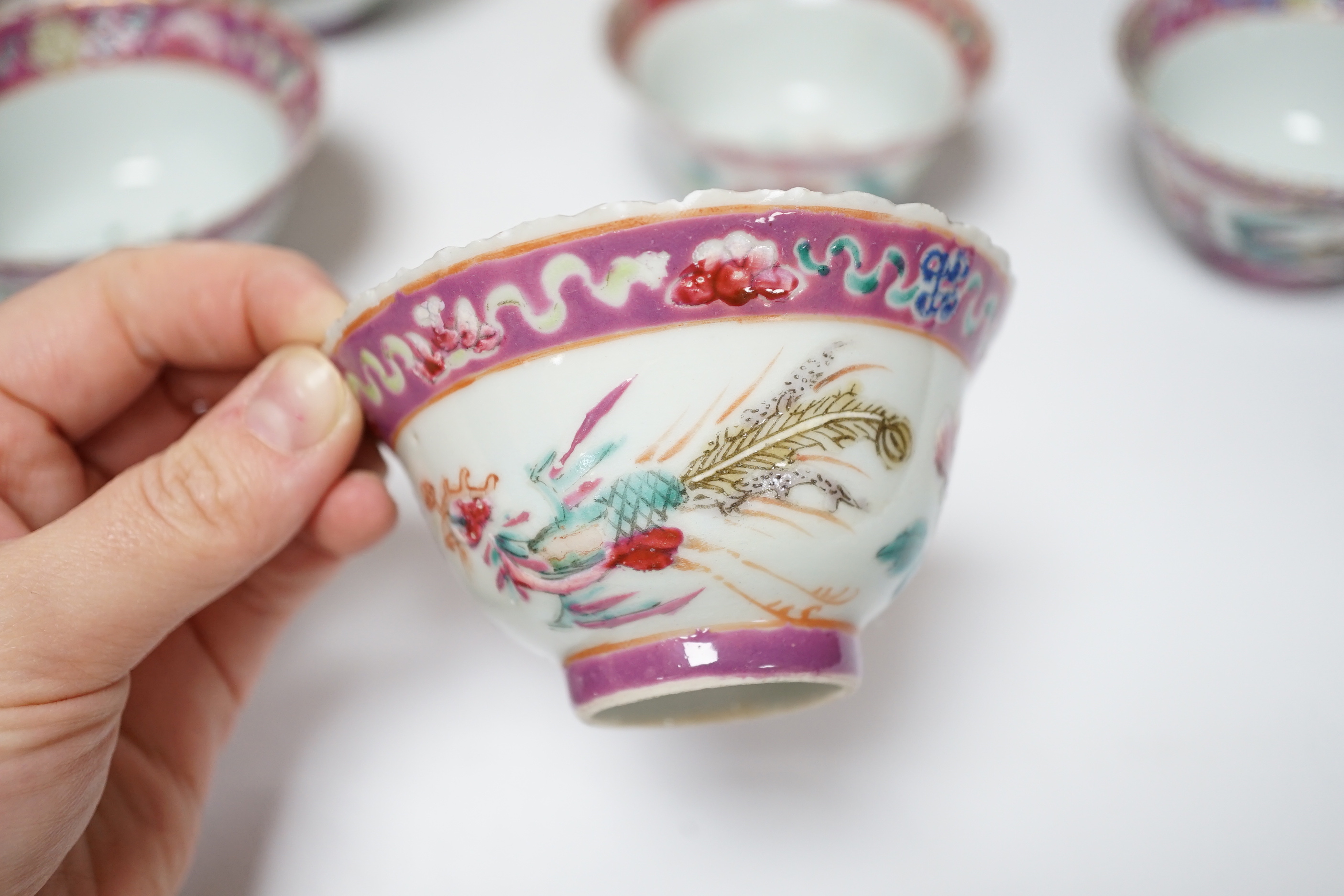 A Chinese Straits enamelled porcelain teapot and cover and seven similar tea bowls, Guangxu period and a pillow, teapot 18cm high including cover